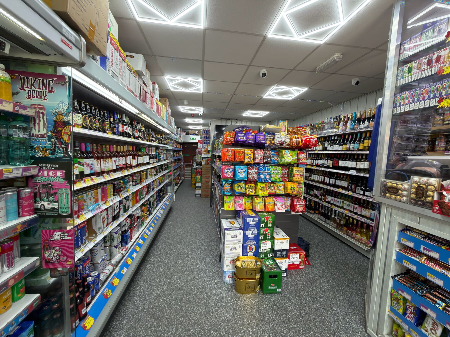 BoozeXpress aisle with wines, spirits and snacks